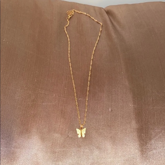 Urban Outfitters Jewelry - Yellow butterfly necklace